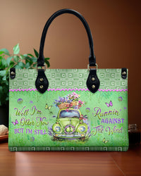 RUNNING AGAINST THE WIND LEATHER HANDBAG - YHLT2703242