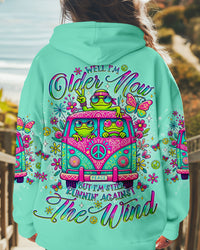 RUNNING AGAINST THE WIND BUS FROG ALL OVER PRINT - TLNO2211243