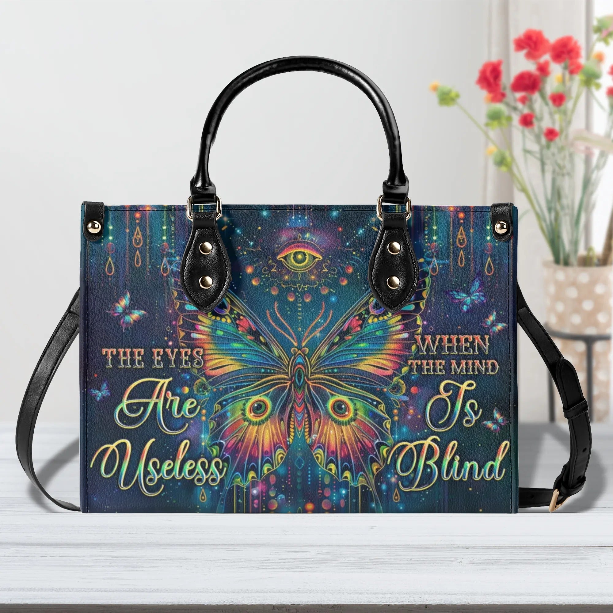 THE EYES ARE USELESS WHEN THE MIND IS BLIND BUTTERFLY LEATHER HANDBAG - TLPQ2406245